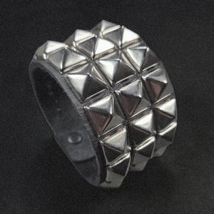 Leather Cuff Bracelet Studded With Three Rows Pyramid Studs - Black