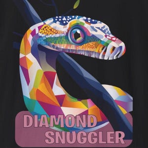 May include: A colourful geometric design of a snake with a bright blue eye. The snake is wrapped around a branch. The text "DIAMOND SNUGGLER" is printed in pink on a pink background.