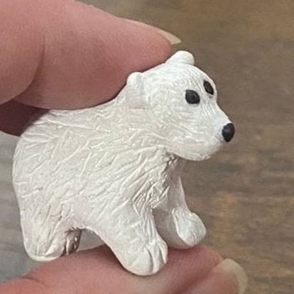 Miniature polar bear figurine