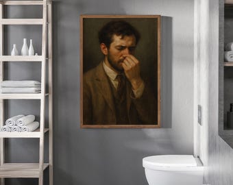 May include: A framed portrait of a man in a brown suit, touching his nose, hangs on a gray wall. The bathroom setting includes a white toilet, a wooden shelf with towels and decorative bottles, and the text "THE NORTH GALLERY".