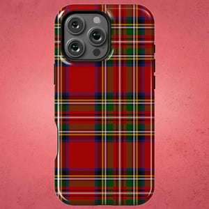 May include: A red, green and yellow tartan phone case with a black camera lens cutout.