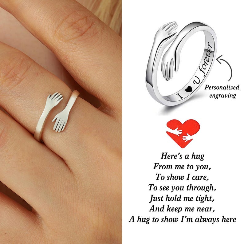 May include: Silver ring with two hands forming a hug, engraved with "I love you forever". The ring is on a finger and a close-up of the ring is shown on the right side of the image. The text "Personalized engraving" is below the close-up image.