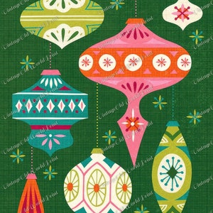 May include: A set of six vintage-style Christmas ornaments with geometric patterns in shades of green, pink, orange, white, and teal. The ornaments are hanging from strings against a green background.