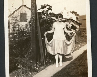 Beautiful Flapper Woman Shows off Flared Skirt Original Vintage Photo Vernacular Snapshot Garden 1920s Family Fashion Bobbed Hair