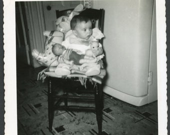 Baby Seated on Chair Crammed with Dolls Stuffed Bunny Rabbit Toys Original Vintage Photo Snapshot Family 1950s Fashion Family Childhood