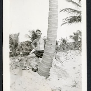 Slender Shirtless Man Leaning on Palm Tree Swimsuit Original Vintage Photo Snapshot 1940s Fashion Summer Beach