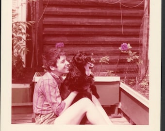 Happy Woman Pixie Haircut Snuggles Cute Black Spaniel Dog In Urban Patio Garden Mid Century Vintage Photo Snapshot 1950s Pets Love 1