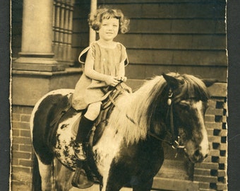 Cute Little Smiling Cowgirl Sitting on a Pony Hat Original Vintage Photo Snapshot 1950s Family Girl Horse Animals Equestrian Western