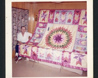 Proud Middle Aged Man Shows Off Prize Winning Hand Made Quilt Vintage Square Photo Snapshot 1970s Fashion Sewing Crafting