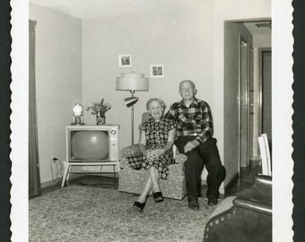 Happy Middle Aged Couple in Living Room Man Women TV Television Vintage Square Photo Snapshot 1950s Fashion Mid Century Interior Lampshade