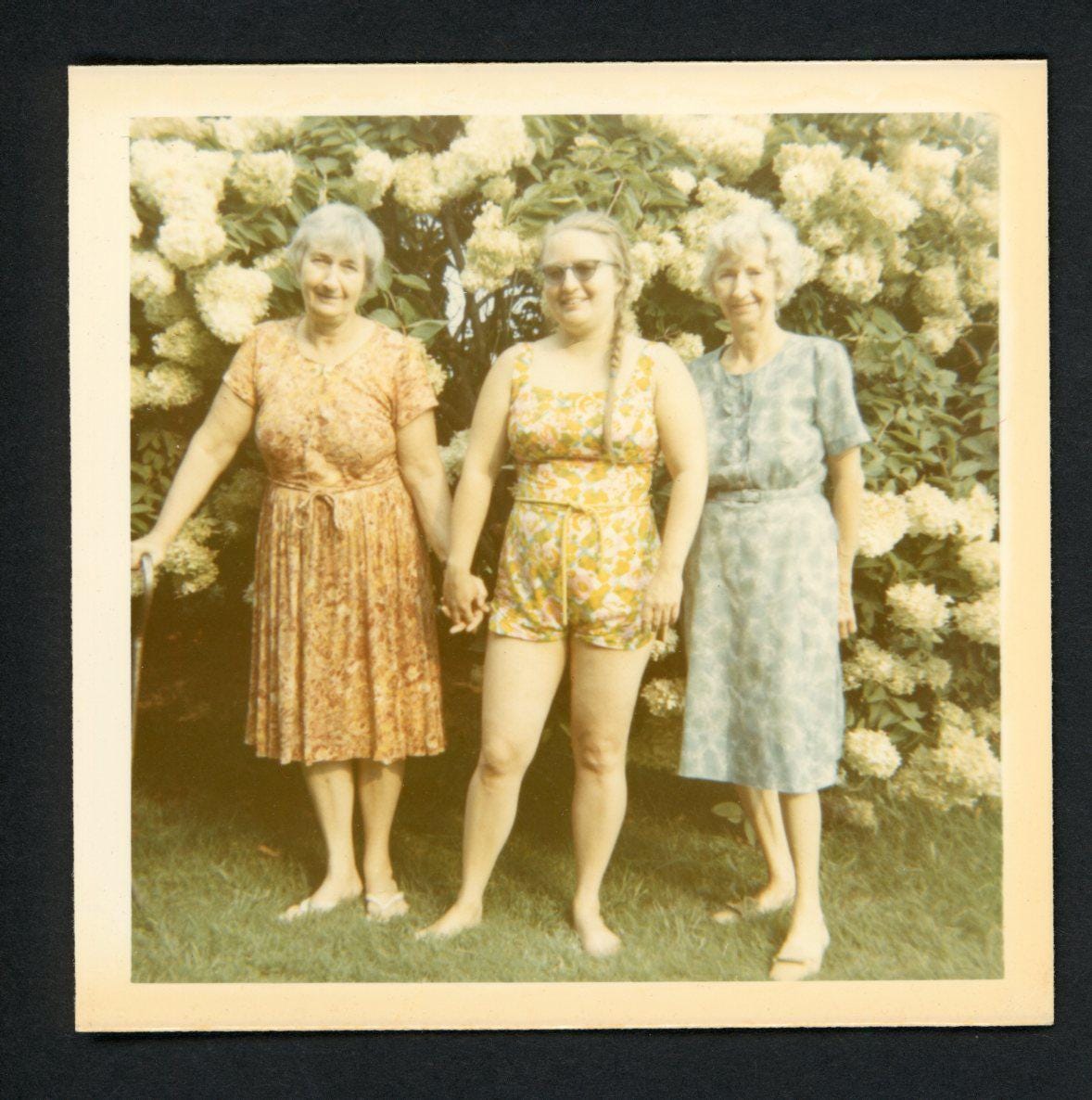 Three Women Colorful Dresses Next to Hydrangea Bush Garden Vintage Photo Square Snapshot 1960s Family Spring Family