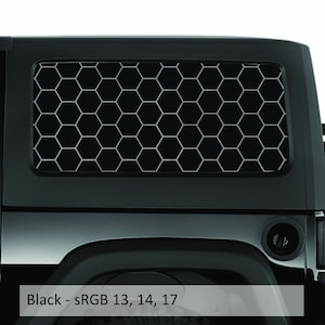 May include: Black rear window privacy screen with a honeycomb pattern. The screen is made of a durable material and is easy to install.