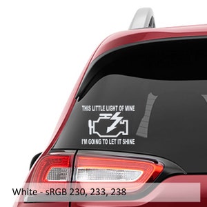 May include: A white vinyl decal for a car with the text "This little light of mine I'm going to let it shine" and a stylised image of a car's check engine light. The text is in a white sans-serif font.