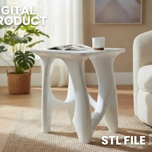 Può includere: Un tavolino bianco lucido con un design scultoreo unico. Il tavolo ha un piano quadrato e gambe curve con spazi aperti. Una tazza bianca con base in legno è appoggiata sopra. Le parole "DIGITAL PRODUCT" e "STL FILE" sono visibili.