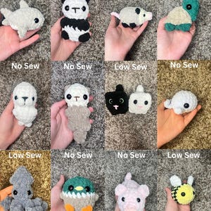 May include: A collection of 12 crocheted stuffed animals, including a panda, a shark, a turtle, a possum, a cat, a seal, a pig, a bee, a duck, an octopus, and a sloth. The animals are all made with different colors of yarn and have different facial expressions. Some of the animals have sewn eyes, while others have no sew eyes. The animals are all about 3 inches tall.