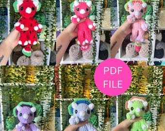 May include: A collection of six crochet dinosaur plushies, each representing a different fruit: watermelon, dragonfruit, strawberry, grape, blue raspberry, and kiwi. The plushies are colorful and have a cute design, with a PDF file graphic in the center.