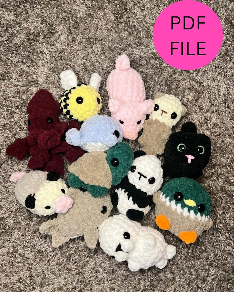 May include: A collection of 12 crocheted stuffed animals, including a bee, pig, turtle, panda, duck, octopus, dolphin, cat, and a few others. The animals are all different colors and have cute faces.
