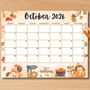 May include: An autumn-themed October 2026 calendar. The beige calendar features illustrations of pumpkins, mushrooms, and leaves in orange and brown. The text "October 2026" and "Hello autumn" are displayed on the calendar.