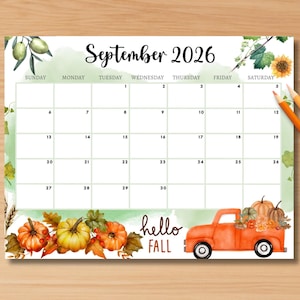 May include: A September 2026 calendar with a watercolour design. The calendar features a decorative border with pumpkins, leaves, and a red truck. The words "hello FALL" are written in a script font. Coloured pencils are on the right side.