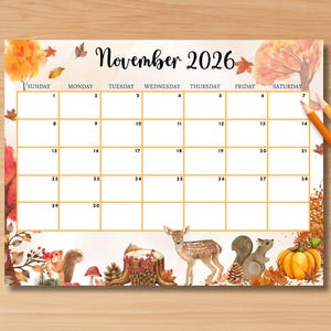 Puede incluir: Un calendario de noviembre de 2026 con tem&aacute;tica oto&ntilde;al. El calendario presenta un dise&ntilde;o de acuarela con hojas, &aacute;rboles, un ciervo, una ardilla y una calabaza de color naranja y marr&oacute;n. L&aacute;pices de colores a la derecha.