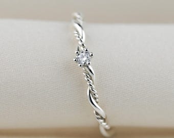 "Phoenix" rope ring in 925 sterling silver • with diamond in prong setting • delicate braided ring with brilliant-cut diamond • special ring • gift