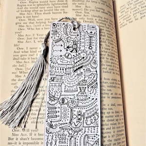 Handmade white doodle bookmarks with matte finish and tassel