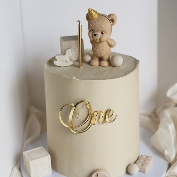 Fondant teddy bear cake topper, bear blowing out a candle