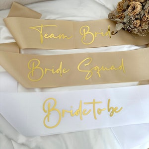theBRIDESBOXX JGA Schärpen Bride to be Bride Squad Team Bride Brautjungfern Set Junggesellenabschied Champagner Beige