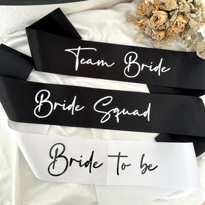 theBRIDESBOXX JGA Sashes Bride to be Bride Squad Team Bride Bridesmaids Set Bachelor Party black white black white