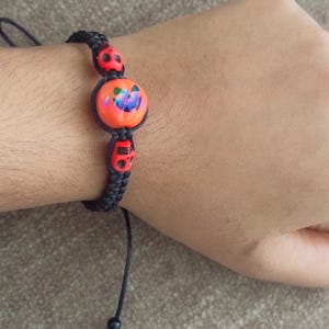 Handmade Macrame Halloween Bracelet: Black Pumpkin Skull Pendant