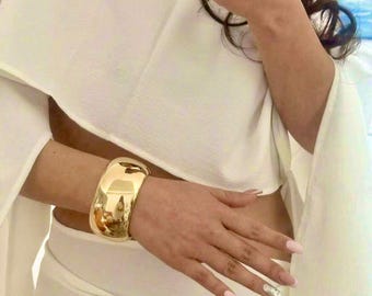 Pulsera de esclava chapada en oro de 18 quilates, cúpula de acero inoxidable, estilo grueso y audaz.