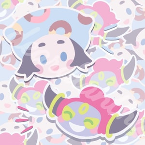 Peut inclure: Motif répété d'autocollants de personnages de dessins animés. Les autocollants présentent un fond bleu clair avec une variété de visages de dessins animés roses, violets et bleus. Certains personnages ont des cheveux roses et des accents jaunes.