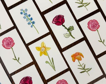 Mini láminas de acuarela con variedad de flores