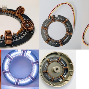 May include: A circular black printed circuit board featuring multiple copper wire coils, small electronic components, and integrated LED lights. The assembly includes wiring harnesses and is shown in various states of illumination, including red and white light modes.