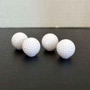 Bouchons de tige de valve pour balles de golf