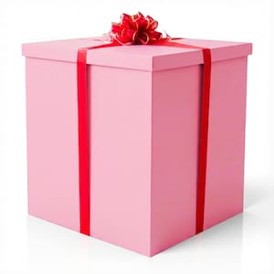 May include: A large, square, pink gift box with a red ribbon and bow. The ribbon wraps around the box and is tied in a bow on top. The box is sitting on a white surface.