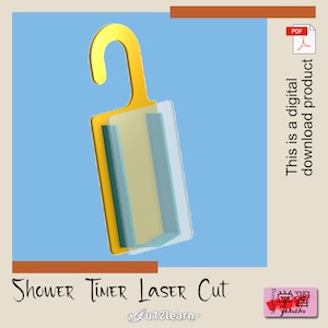 May include: A yellow shower timer with a hook for hanging on a door. The timer is made of laser cut acrylic and has a clear plastic overlay. The text "SHOWER TIMER LASER Cut" is written below the image. The text "u12learn." is written below the text "SHOWER TIMER LASER Cut". The text "learning 学習 gakushu" is written in a pink box in the bottom right corner of the image.
