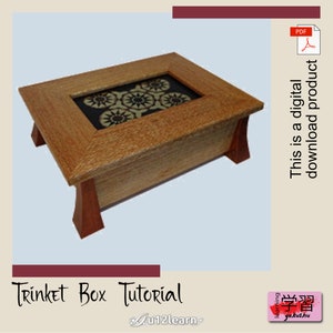 May include: A wooden trinket box with a clear glass top and a decorative inlay. The box has a light brown finish and is sitting on a light blue surface. The text "Trinket Box Tutorial" is written below the box.