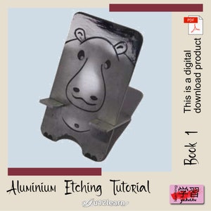 May include: A digital download tutorial for etching aluminum. The tutorial features a phone stand with a cartoon hippopotamus design. The tutorial is available as a PDF download.