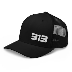 May include: Black and white trucker hat with a white embroidered "313" on the front.