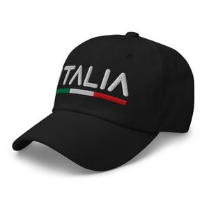May include: A black baseball cap with white embroidered text that reads "ITALIA" and a small Italian flag above the text.