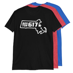 May include: Black t-shirt with a white outline of the state of Massachusetts and the text "BOS TON 617" with a white star.