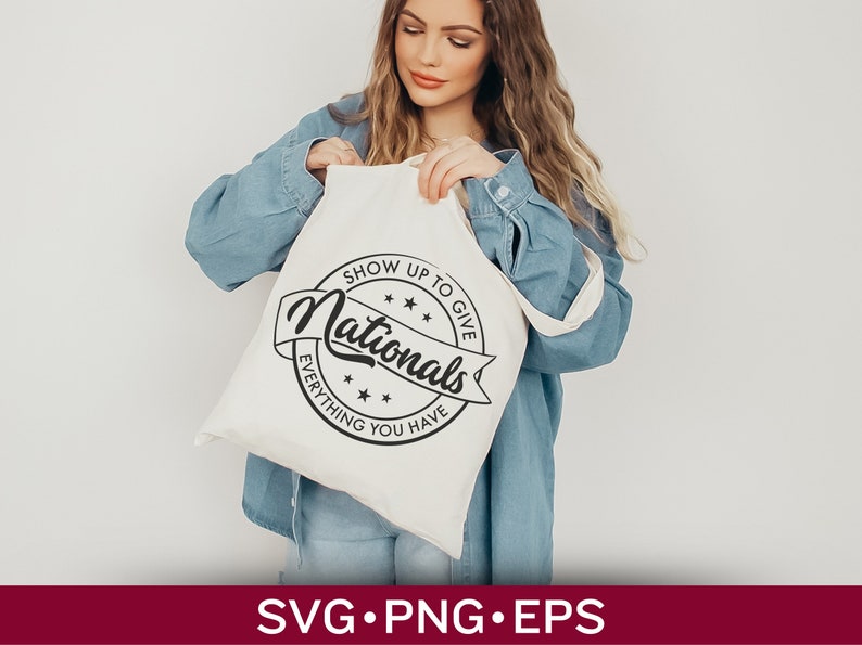 May include: A white tote bag with a black circle design that says "Show Up To Give Everything You Have Nationals".