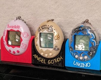 Customizable Stand / Cradle / Holder for the Original Tamagotchi - 3D Print