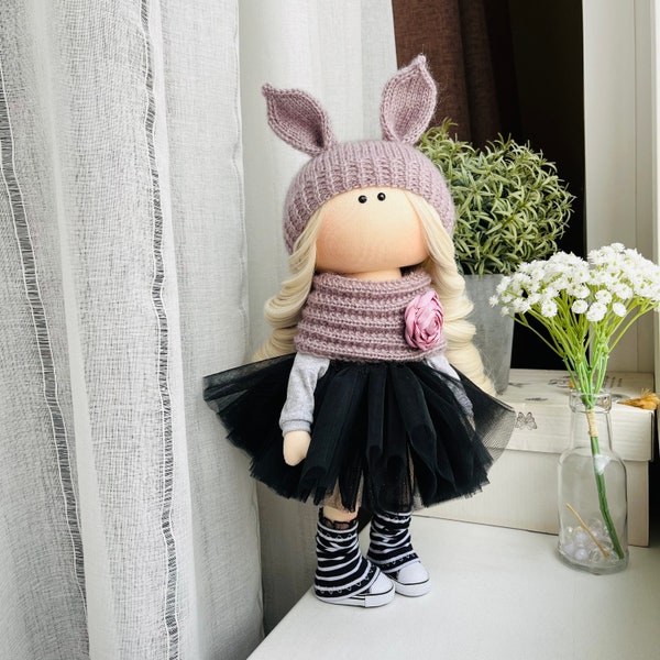 Interior fashionable textile doll Tilda, dressed in a black fluffy tutu skirt, Handmade rag doll Tilda