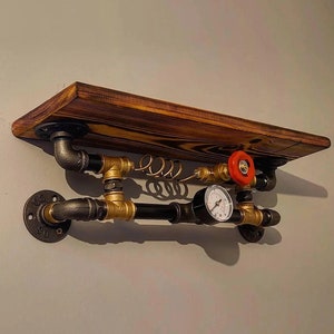 May include: A rustic wooden shelf with black pipe fittings and gold accents. The shelf features a pressure gauge and a red valve.
