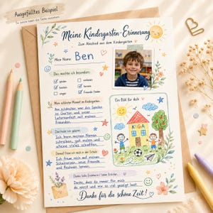 May include: A kindergarten memory sheet with the title Meine Kindergarten-Erinnerung, featuring a photograph of a child, handwritten German text, and colorful illustrations of a house, sun, and flowers. The page includes sections for name, favorite activities, and school goals.