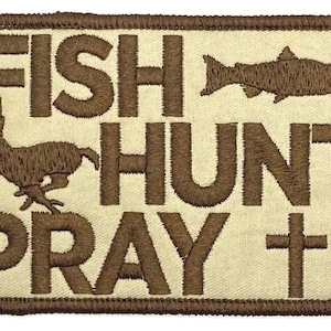 May include: Brown embroidered patch with the words "Fish Hunt Pray" and a cross. There is a fish and a deer silhouette on the patch.