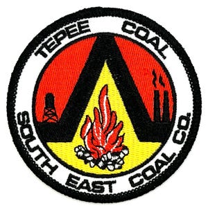 May include: Embroidered patch with the text "TEPEE COAL CO." and "SOUTH EAST COAL CO." in a circular design. The patch features a red and yellow triangle with a stylized flame, smokestacks, and an oil derrick.