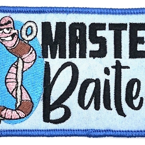 May include: Embroidered patch with a blue border, featuring a cartoon worm on a hook with the text "Master Baiter".